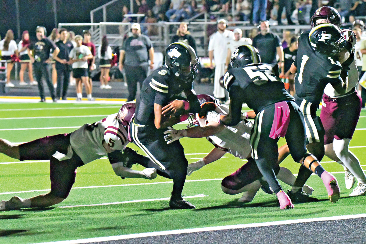 Palmer quarterback Eric Cisneros (3) rushed for 172 yards and four touchdowns while picking up 7.5 yards per carry, and also threw for 225 yards and one TD while completing 80% of his passes. Photo by Fred Phipps.