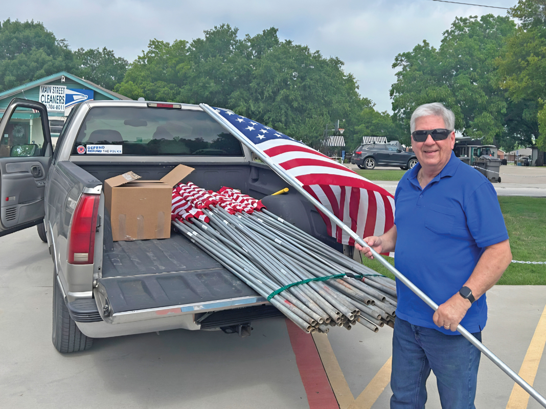 Place 3 Ovilla City Councilmember David Griffin reminds residents of the importance of patriotism with American flags. Submitted photo