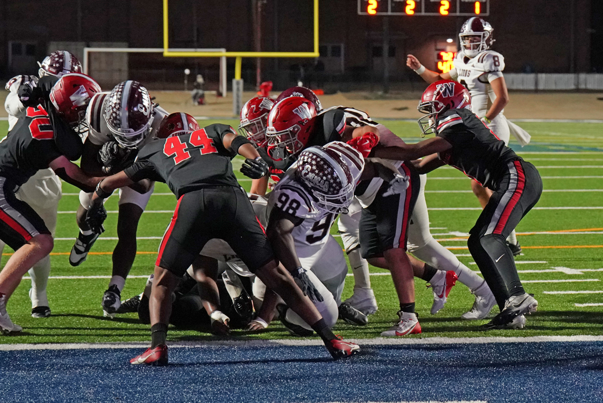 Ennis Senior running back Wenderius Jones (5) rushed for 141 yards and two touchdowns in the win. The Lions will next face the Port Neches-Groves Indians at Montgomery ISD Stadium on Friday, Nov. 21 at 7 p.m. Photo by Lezley Norris.
