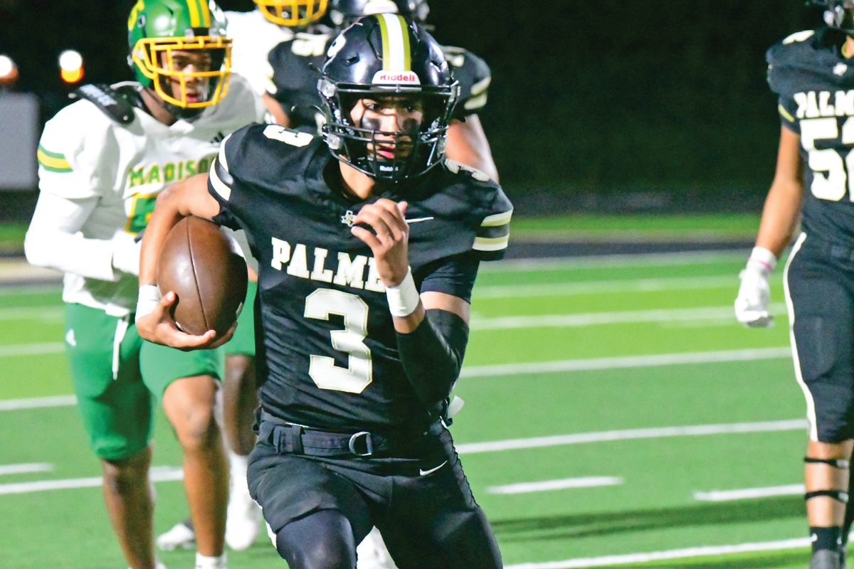 Palmer quarterback Eric Cisneros (3) had another great night, completing 12 of 14 passes for 305 yards and 4 touchdowns, and rushing 9 times for 85 yards. Photo by Fred Phipps.