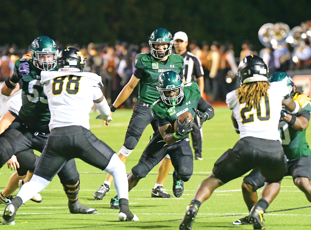 Waxahachie’s Jordan Smith (1) scores from 17-yards out. Kicker Ethan Guillen supplied the point after to make the final score 35-14. Photo by Fred Phipps.