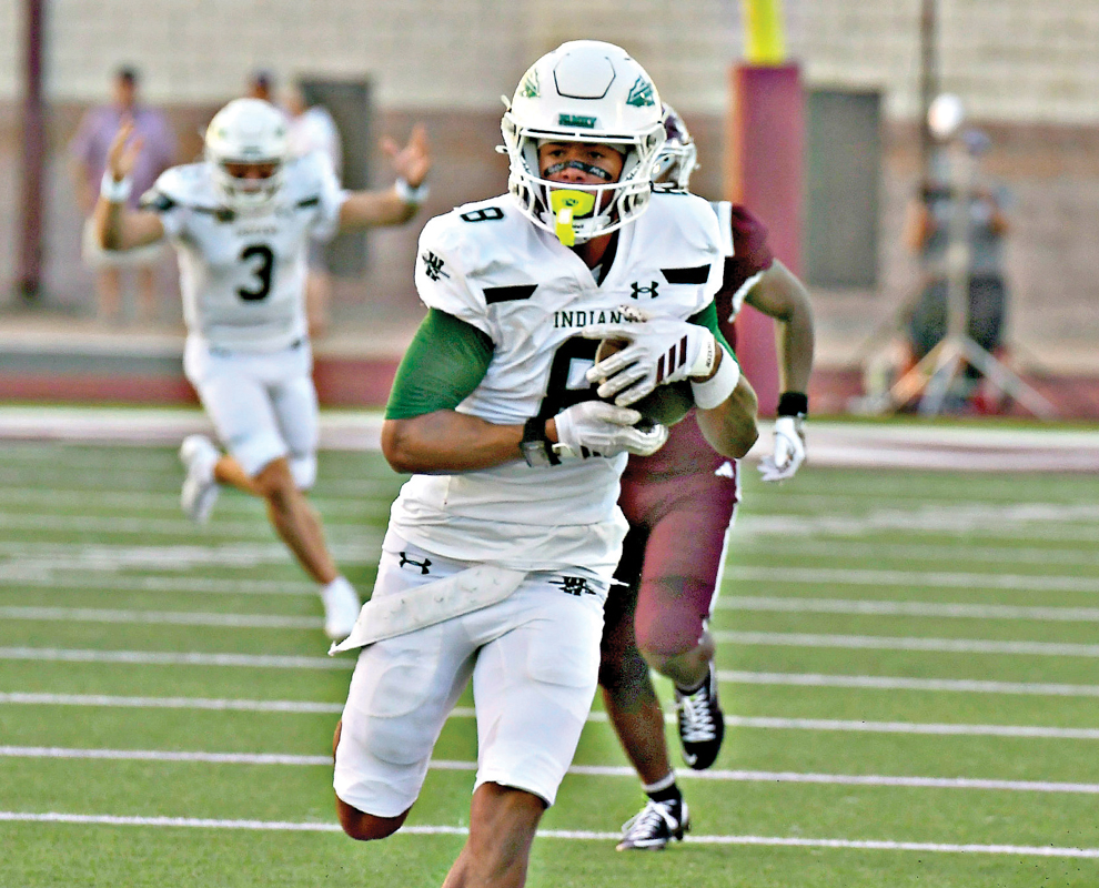Waxahachie sophomore wide receiver Jashawn Crayton (8) had seven catches for 193 yards, including touchdown catches of 55, 44 and 50 yards in the blowout. Photo by Fred Phipps