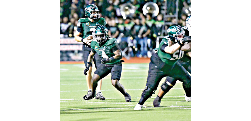 Waxahachie quarterback Jerry Meyer III was 12-for-15 for 246 yards and three touchdowns for the Indians in the first half, but was later injured on a hard hit in the fourth quarter and didn’t return. Photo by Fred Phipps