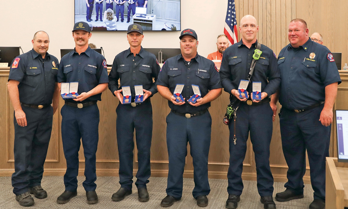 The Red Oak City Council recently recognized the city’s Fire Rescue Department for a swift-water rescue they took part in earlier this year. Submitted photo