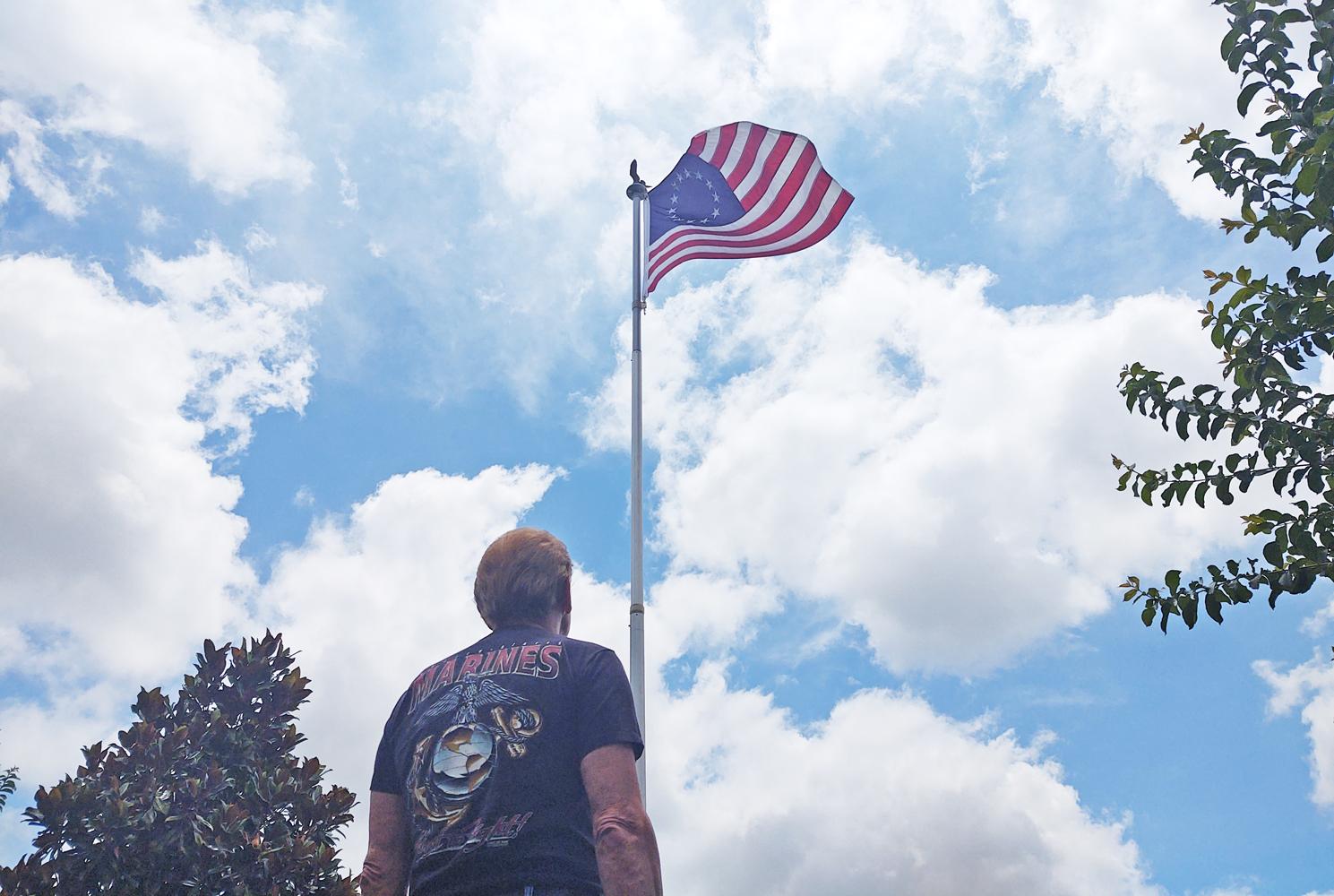 Marty Hiles fights to defend his Betsy Ross flag.