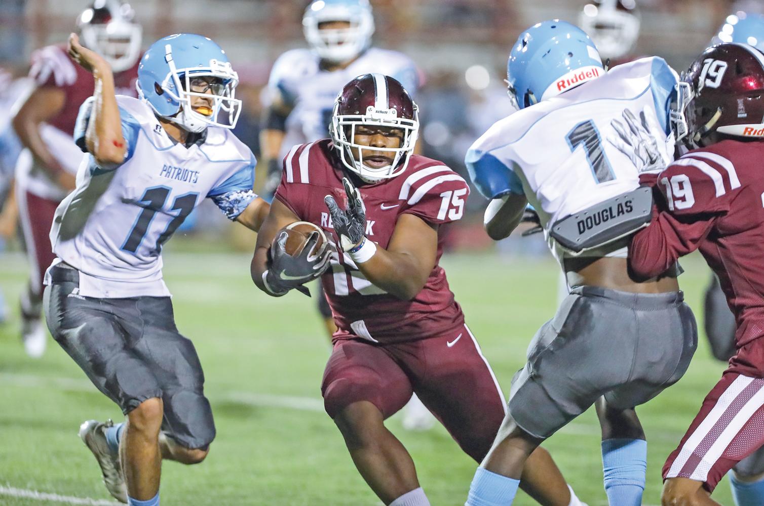 Hawks Running Back CJ Palmer’s (15) first TD run came from 25 yards out and nearly untouched.