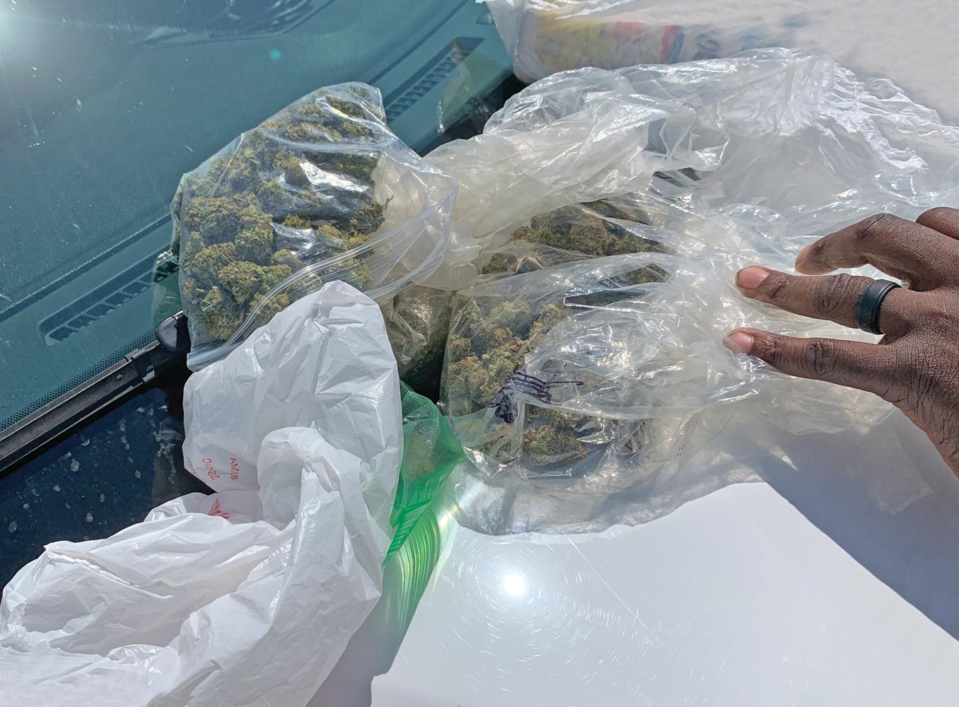The car search yielded a marijuana amount that equals to a state felony charge – possessing marijuana that is equal to or greater than 4 ounces but less than 5 pounds. 