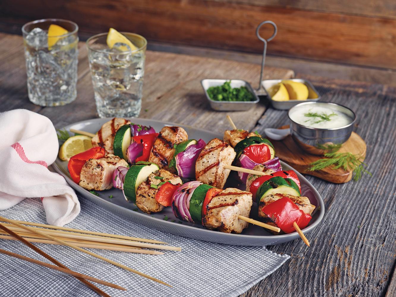 Grilled pork kebabs with Tzatziki Sauce.