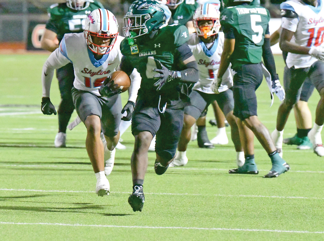 Waxahachie running back Taylen Furlough-Strange (4) rushed 9 times for 95 yards and scored this touchdown. The extra point by kicker Ethan Guillen made the score 28-0 in the first quarter. Photo by Fred Phipps. 