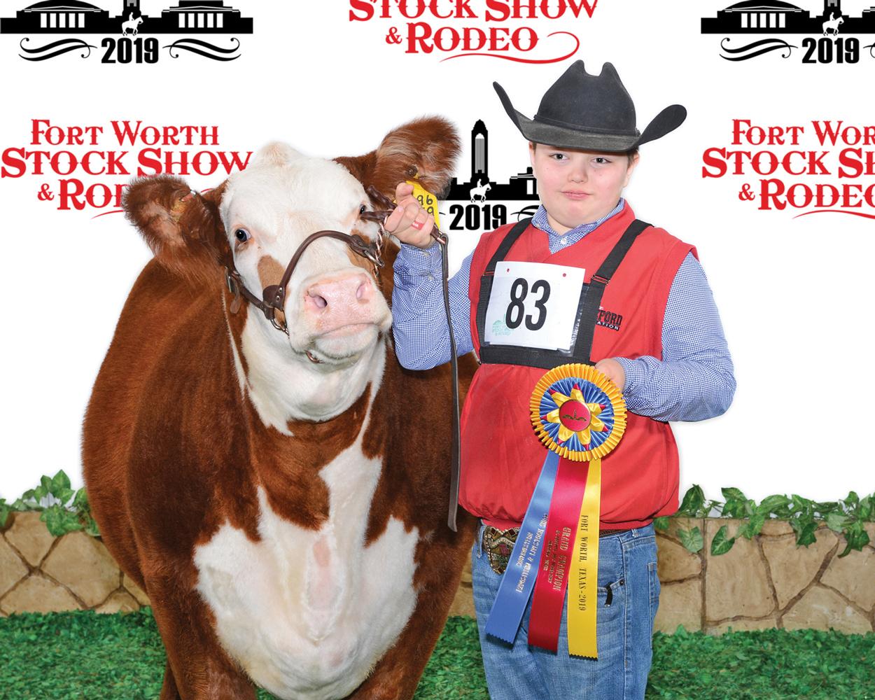 Waxahachie 4-H student Grady Creamer captured Champion Intermediate Heifer and Grand Champion Heifer with HFR Eunicein. Photography by Barron Photografix.