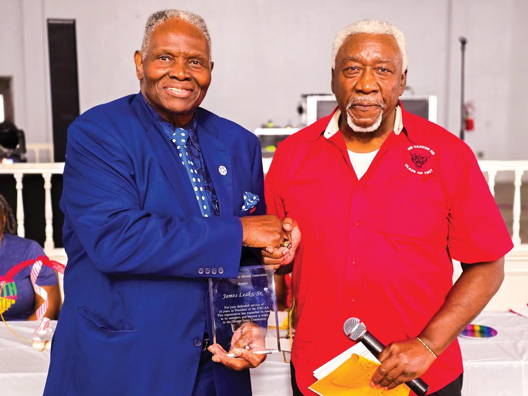 Immediate Past President James Leaks, Sr. (L) receiving award for 18 years of service from President Pro-Tem Edward Lane.
