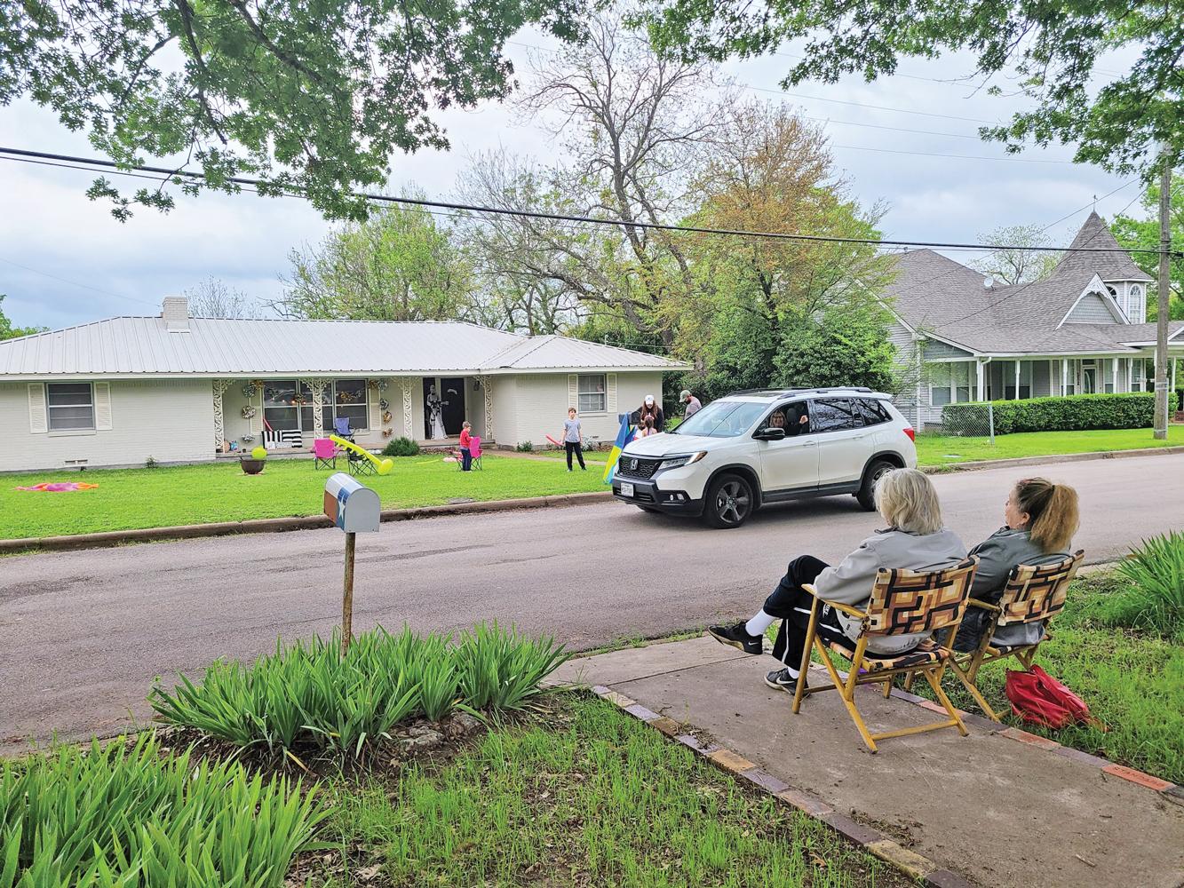 Neighbors from around the town of Italy were asked to drive by and throw candy out to the young boy to say happy birthday Covid-19 style – no close encounters of any kind.