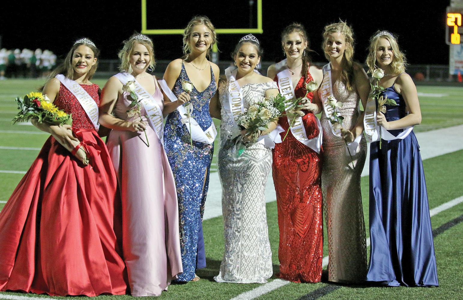Homecoming Queen nominees (L-R): Sophomore Princess Teliya Ezell, Junior Princess Haylee Mathers, nominee Jayden Perkins, Senior Hannah Carr (QUEEN), nominee Courtney Riddle, nominee Alex Jones and Freshman Princess Ady Mathers.