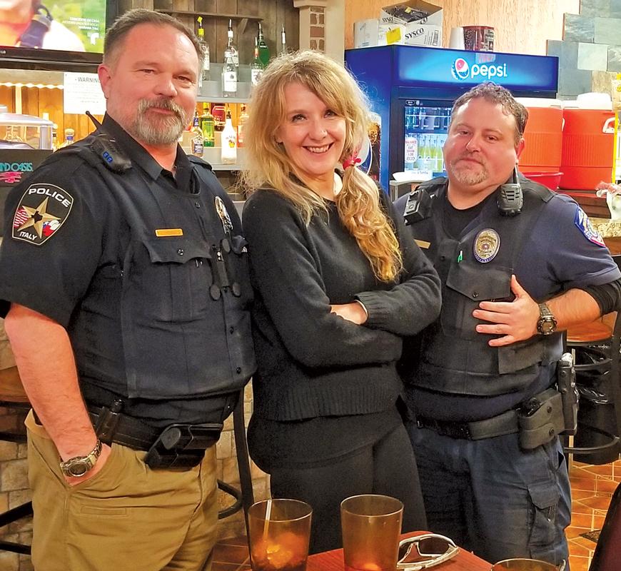 Former Milford Police Officer Chris Elder (R) died several days ago from COVID-19. Shown is Italy Police Officer Kevon Howard and Rita Cook.