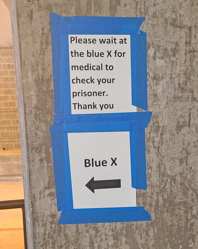 Check-in sign at the Ellis County Jail in Waxahachie.