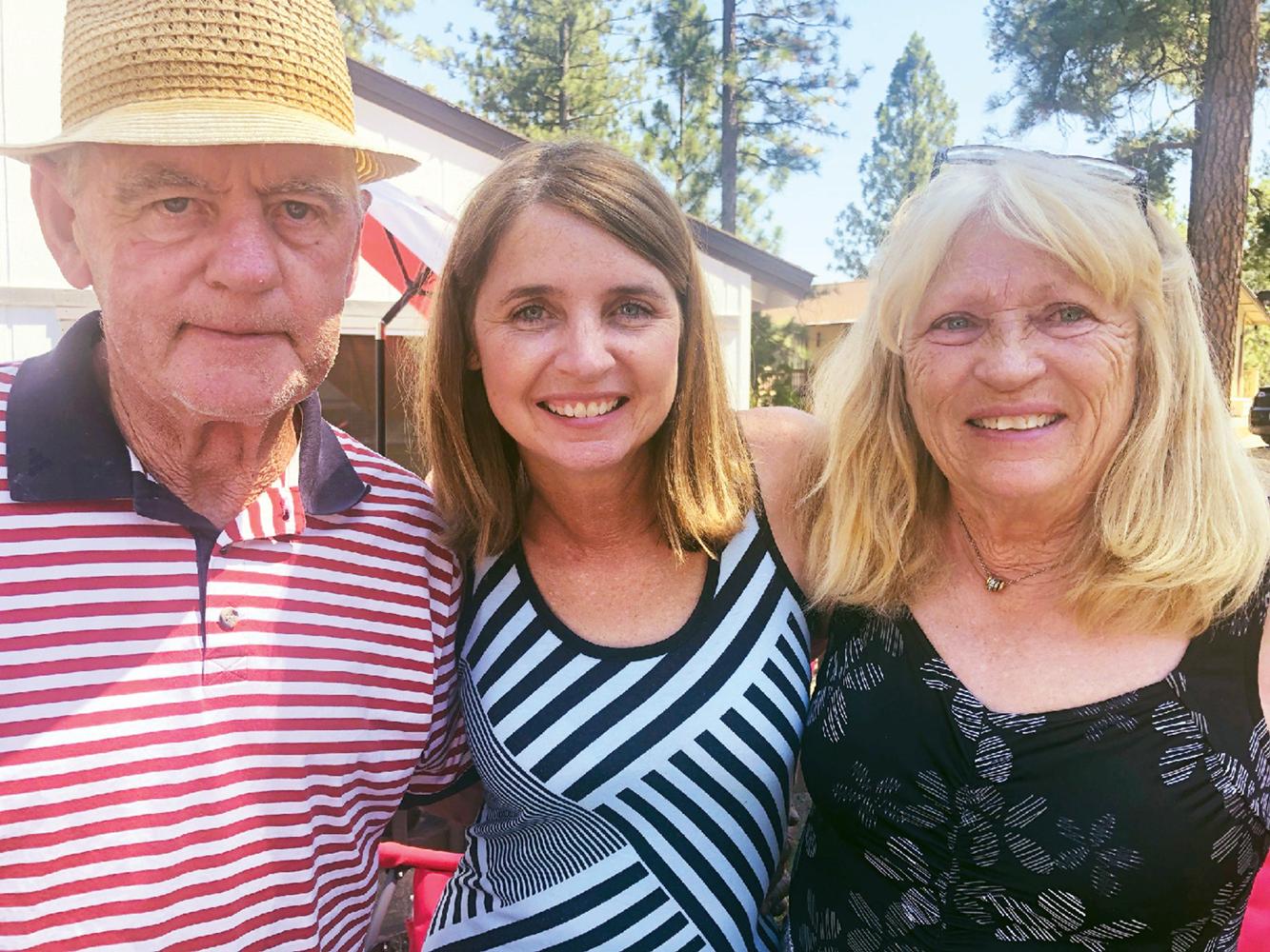 Laura Jean Stephens with her birth parents on the day they met.