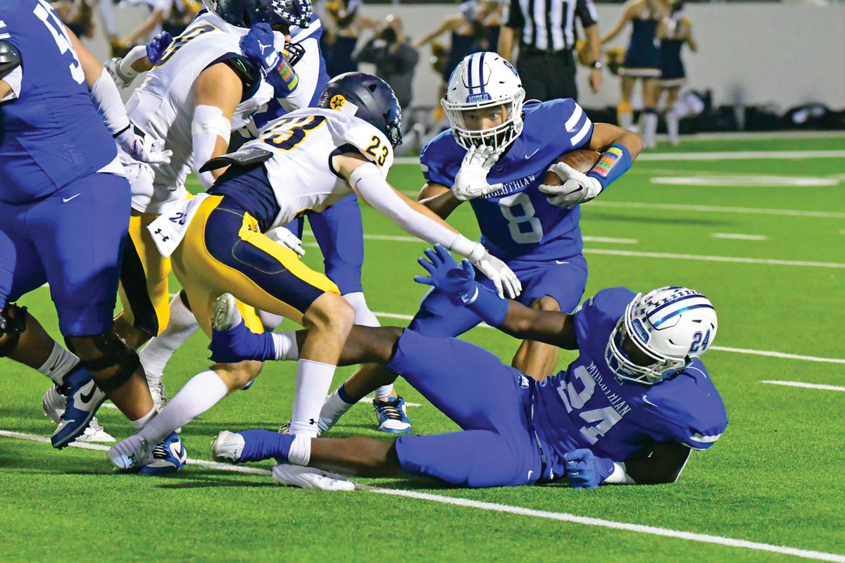 Against the tough Scots defense, Panther quarterback Beau Wendel (8) rushed for 81 yards on 13 carries, including a touchdown. Photo by Fred Phipps.