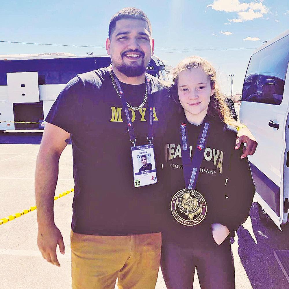Eve Smith and her coach, Ruben Serna.