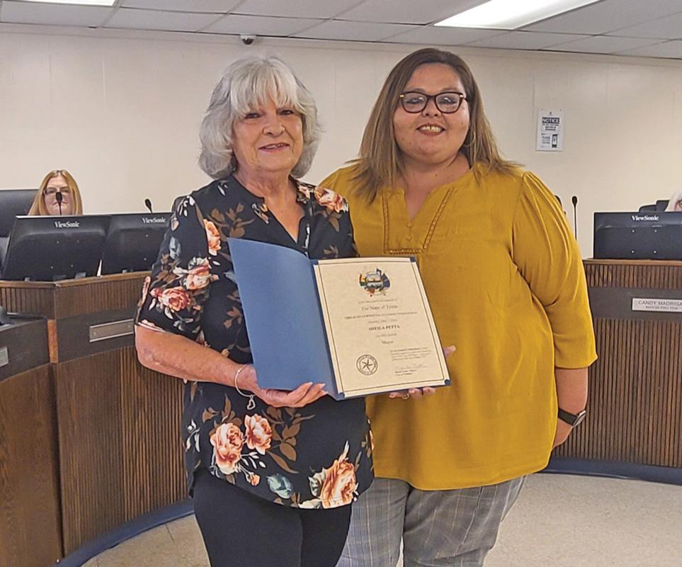 Wilmer Mayor Sheila Petta (L) was sworn into her mayoral seat for another two years.