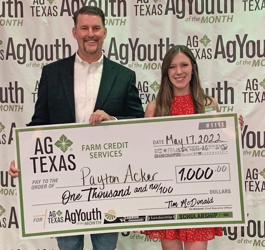 AgTexas Farm Credit CEO Tim McDonald and Payton Acker.