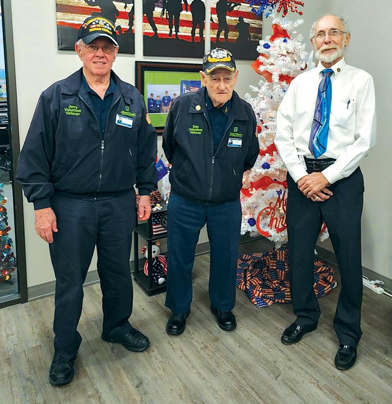 U.S. Army veterans, Jerry Cossette (l) and Don Merchant (m) presented U.S. Air Force veteran Michael Seiber with the Vietnam Veteran Lapel Pin. Presented to fellow veterans who served from Nov. 1, 1955 to May 15, 1975. The Bristol Volunteers present any living United States veteran they visit with this pin on behalf of a grateful nation. 