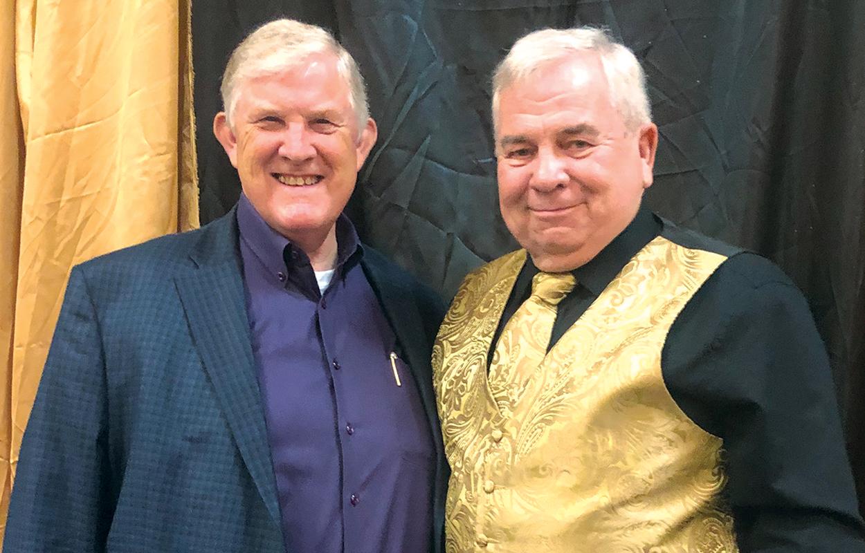Doug Hunt, Access Self Storage and Charles D. Hatfield Jr, The Ellis County Press, pose for a photo and Saturday’s Red Oak Chamber Gala.