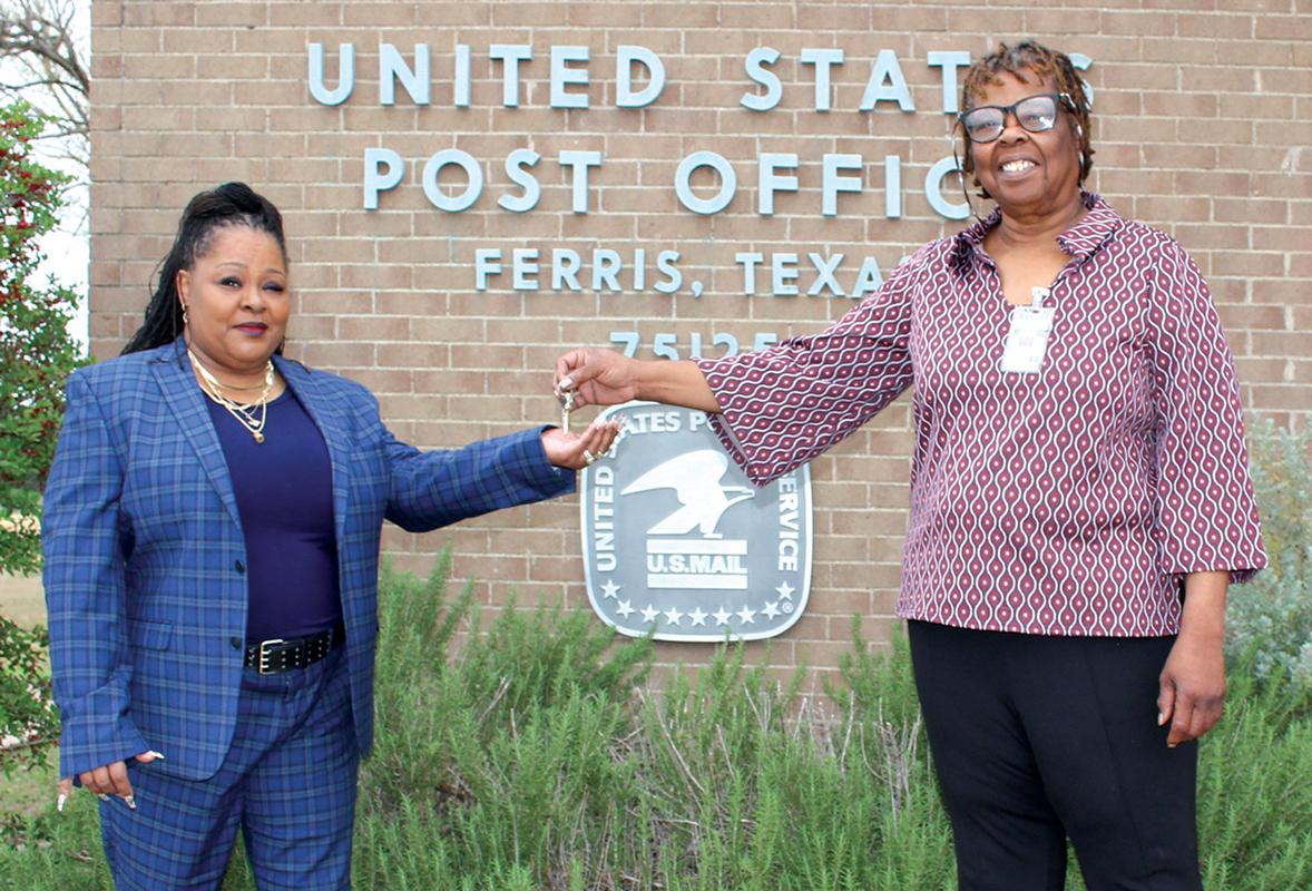 Ferris Postmaster Wanda Curry is seen here passing off the keys to incoming Postmaster ShaRon Tolliver. Tolliver is looking forward to serving the Ferris area. 