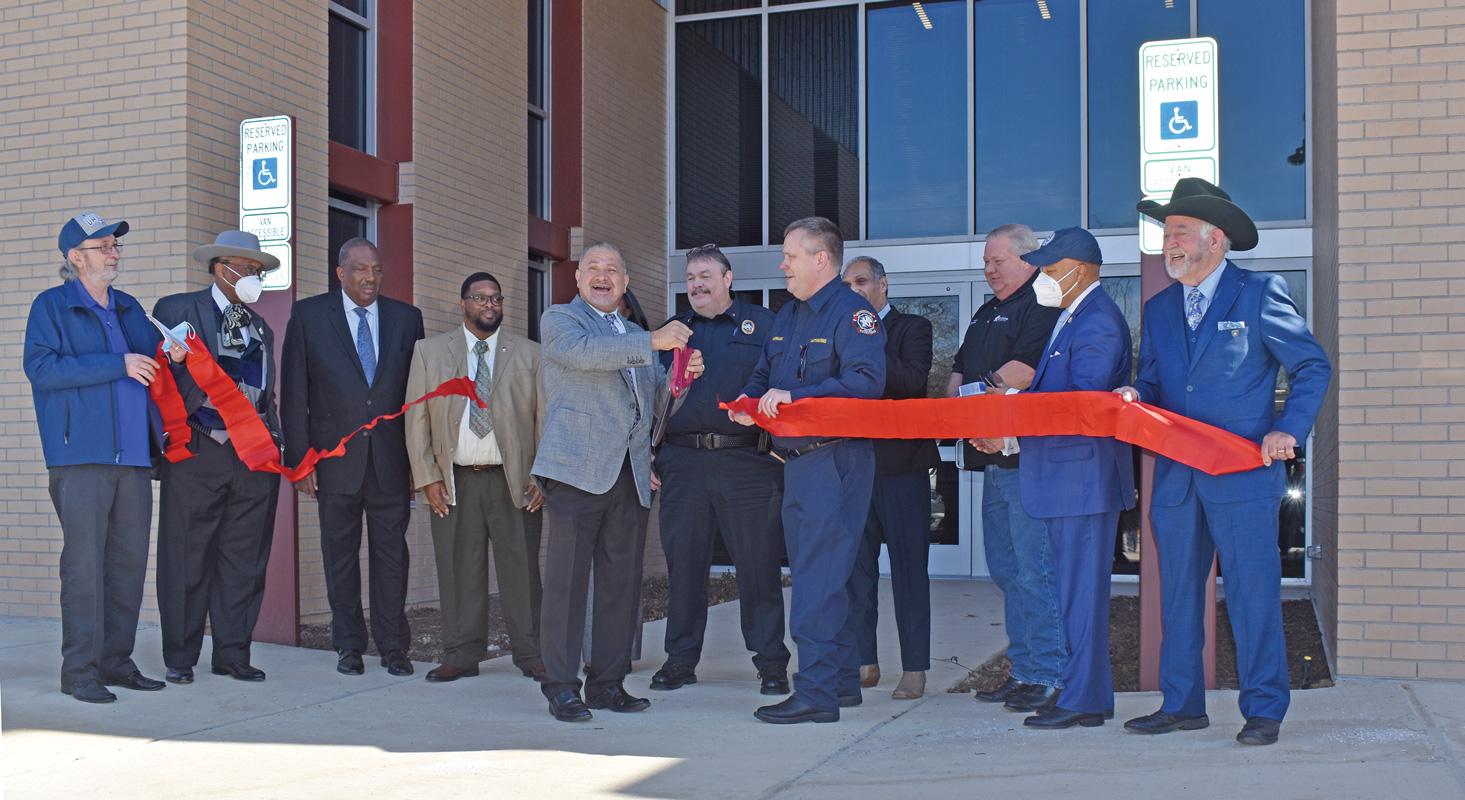 Public officials, city staff and residents gathered outside the city of Hutchins new public safety building last week at a historical ribbon cutting in the Hutchins Fire Department’s apparatus bay located on W. Palestine Street.