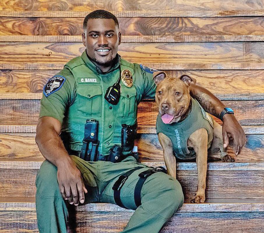 Ferris Police Officer Charles Banks and his former K9 partner Fuse.