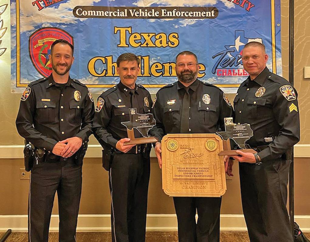 Midlothian Police Department Officer Chris Vinson, with trophy,  returned from Corpus Christi several weeks ago as a two-time second place winner in the Texas Challenge, an event that improves the quality of Texas inspectors and their roadside inspections. He was supported at the competition by Midlothian Sgt. Jordan, Commander Harp and Police Chief Carl Smith.