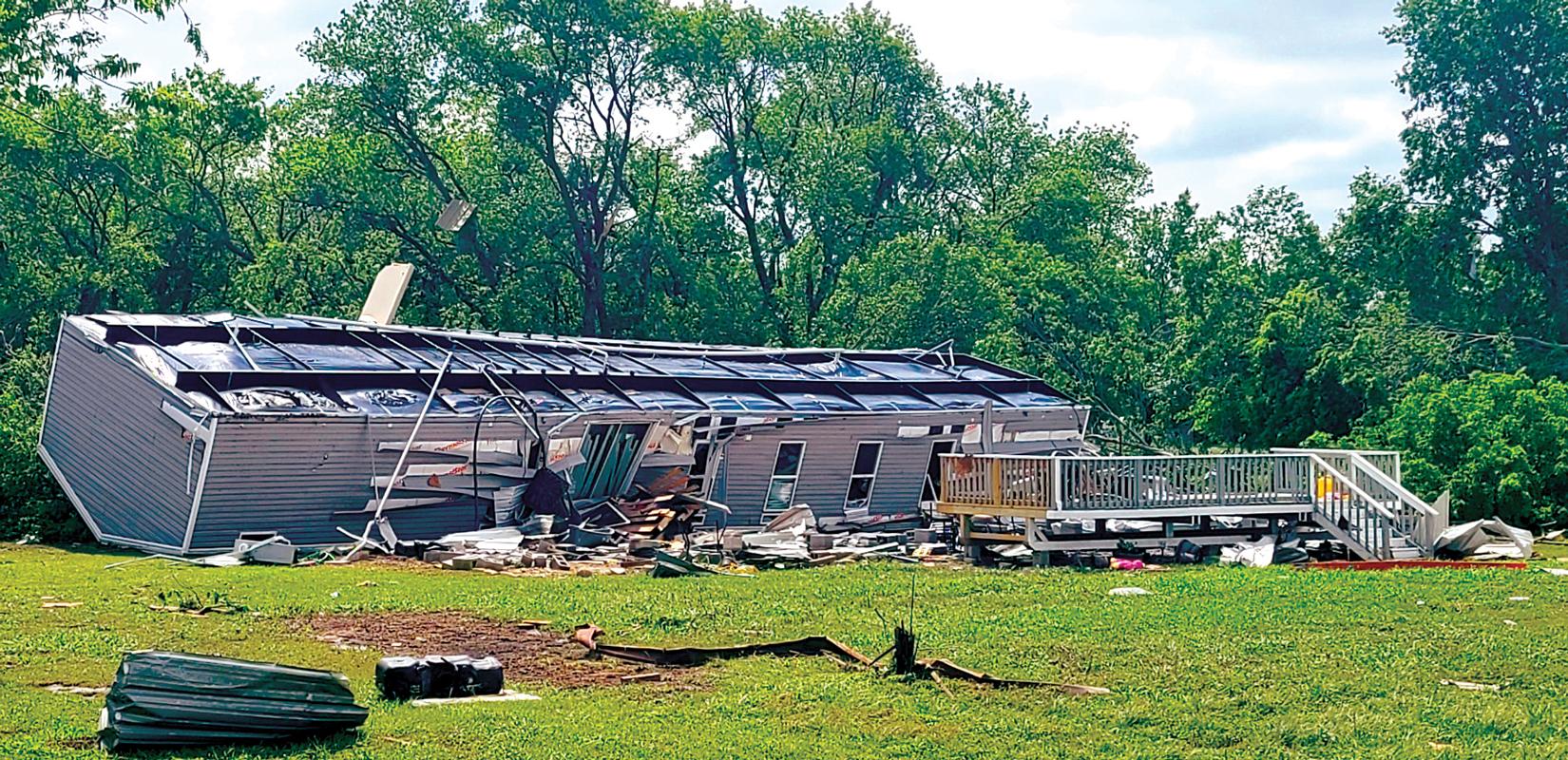 Hail and heavy rain caused widespread damage Monday night in Ellis County. High winds caused two 18-wheelers to overturn on Interstate 35 near Waxahachie. A mobile home was blown over near Forreston, with 14 injuries reported as a result of the storm. Power was lost in several areas around the county.