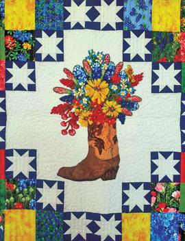The winning ticket for the 2023 Guild Quilt “Texas in Bloom” be drawn at 3 p.m. on Saturday, July 15.