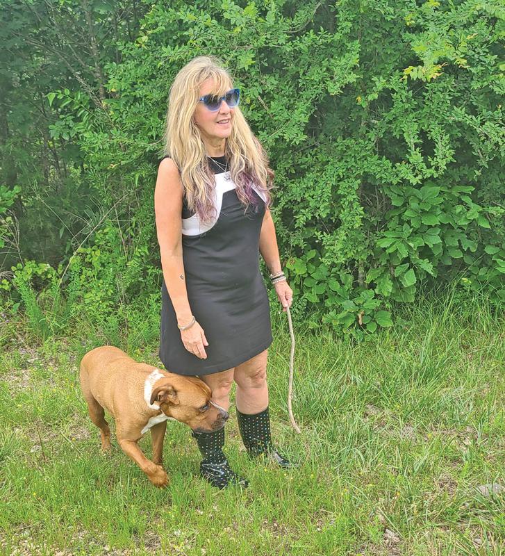 News Editor Rita Cook takes her dog for a stroll.