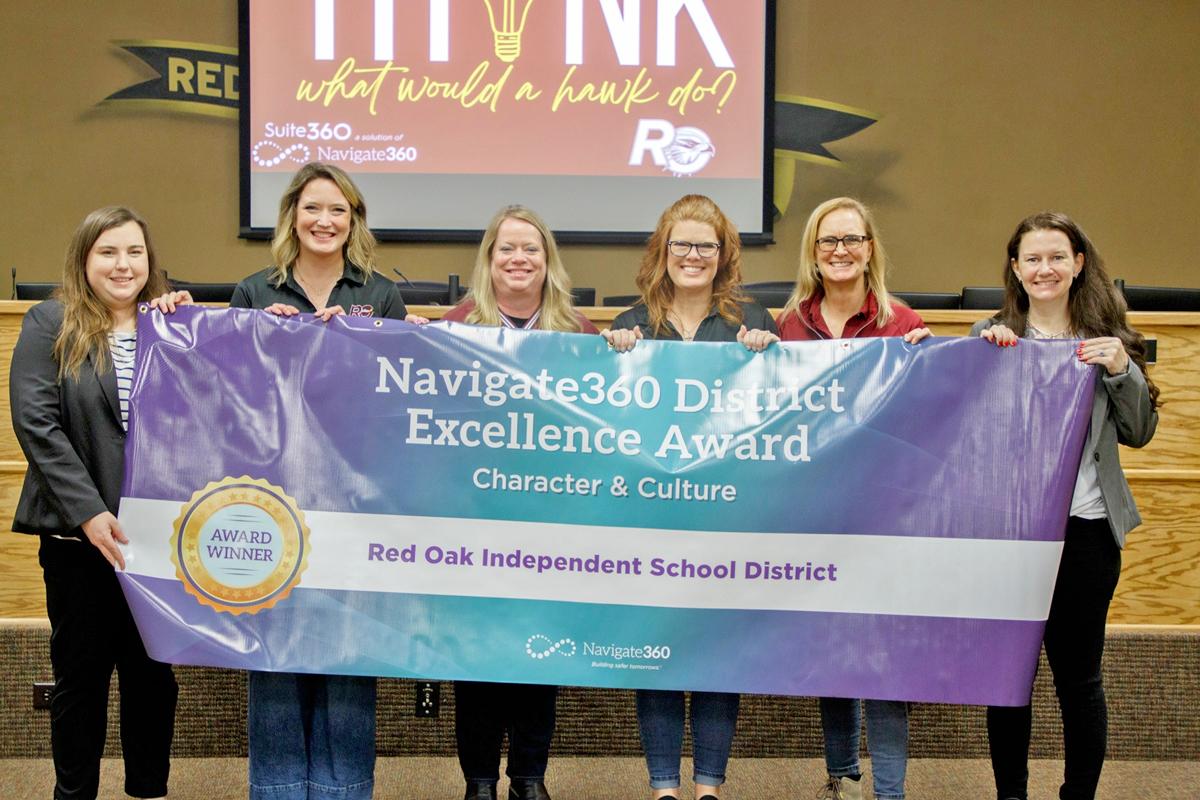 Navigate360 representatives Tiffany Luster and Jacqueline Beavers presented the District Award to Melody Hawkins, Michelle Ailara, Angela Fitzgerald and Beth Trimble.