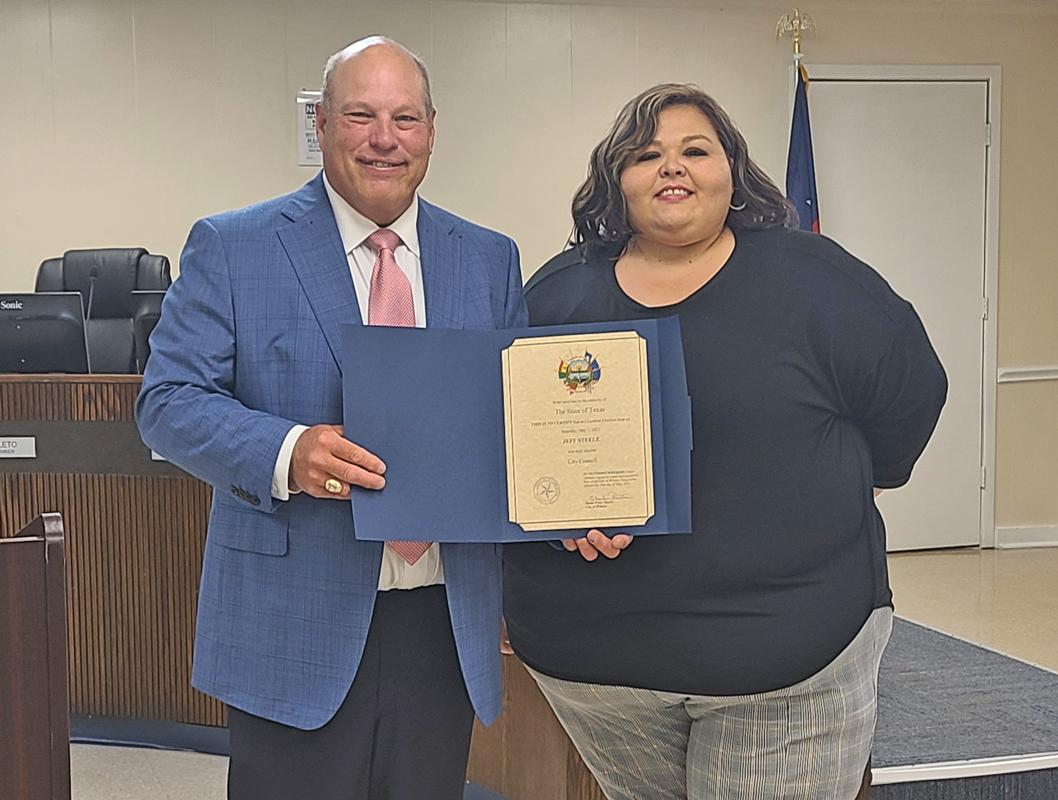 Incumbent Jeff Steele was sworn in by Wilmer City Secretary Mayra Ortiz.