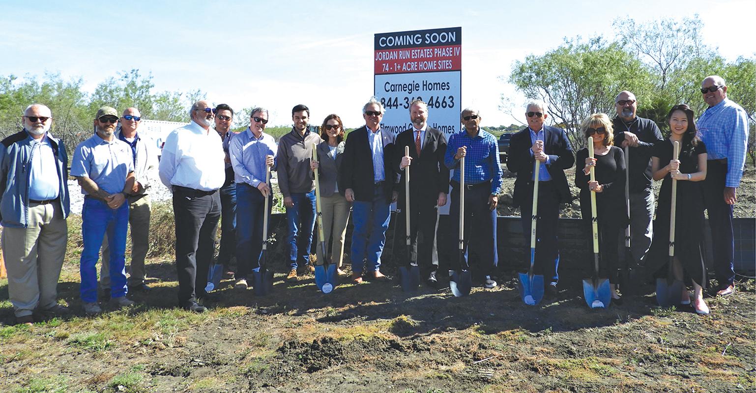 Brian Cottle, Clay Myre and Jamie Burchett with CHC Construction; Mike Bristol, Henry S. Miller (HSM); Chris Harp, CHC; Mark Smith, HSM Development; Drew Donosky, P.E., Claymore Engineering; Lissie and Steve Donosky, President, HSM Development; Greg Miller, President and CEO, HSM; Noorallay Ali, Investor; Robert DuB0is, CFO, HSM; Marilyn Jones, Investor; Darrell Hurmis, HSM; Angela Chen, HSM; Larry Jones, Investor.