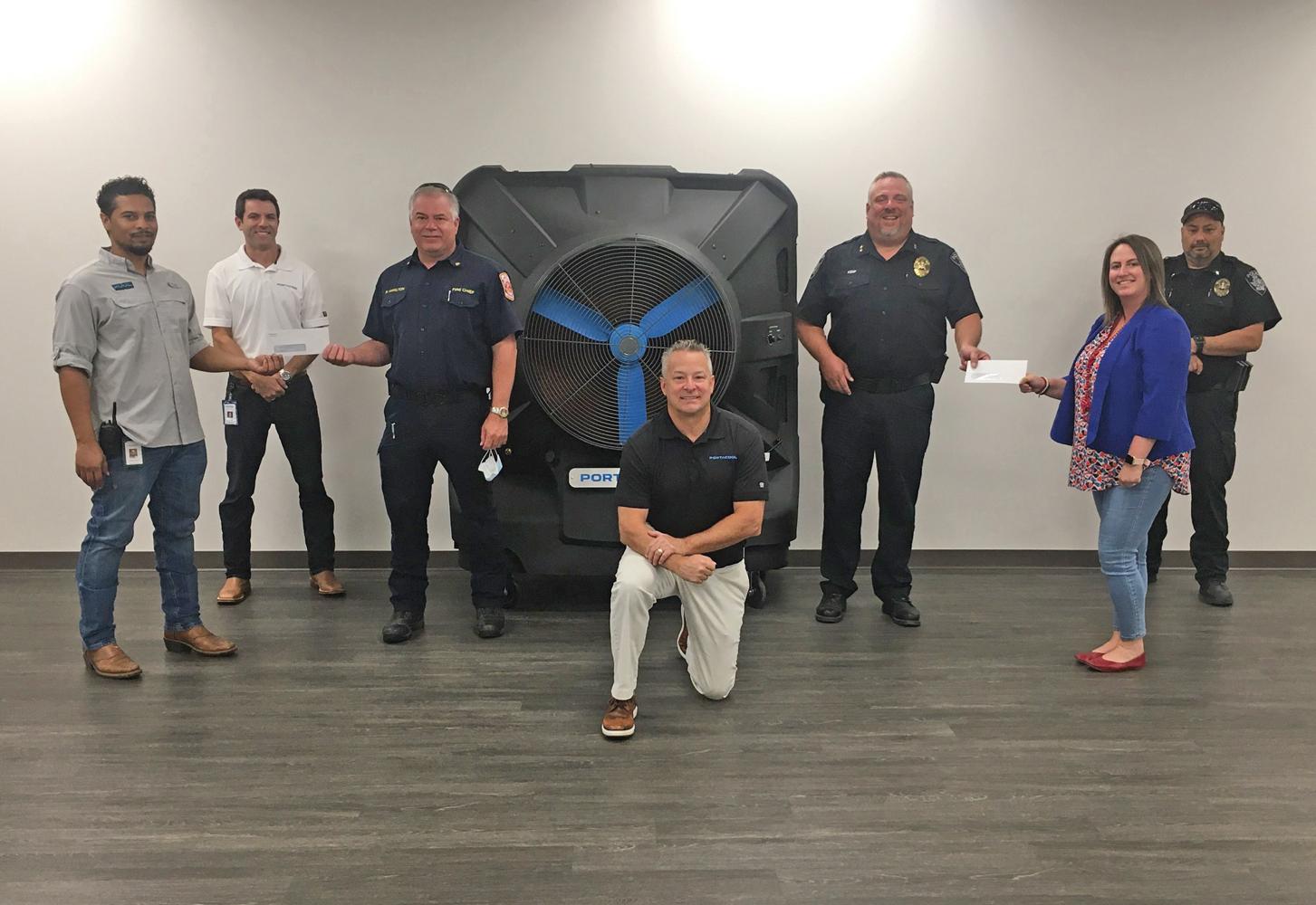 Wilmer’s local Portacool Distribution Center, a worldwide manufacturing leader in the portable evaporative cooling industry recently gifted both the city’s police and fire departments with $1,500 each.
