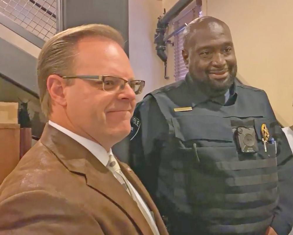 Ellis County Judge Todd Little listens to Ellis County Precinct 3 Constable Curtis Polk talk about the covering up of the segregation-era ‘Negroes’ sign during a Facebook Live on Nov. 18, 2020 at the Ellis County Courthouse in Waxahachie.