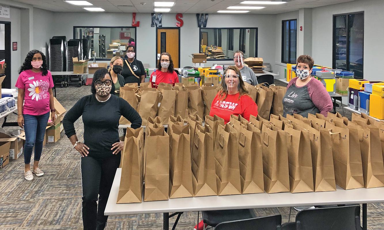 After receiving the supplies, volunteers at LMSW Waxahachie got to work sorting and organizing the supplies into large bags for teachers of their sister campuses that would help replenish some of what was lost in their classrooms.