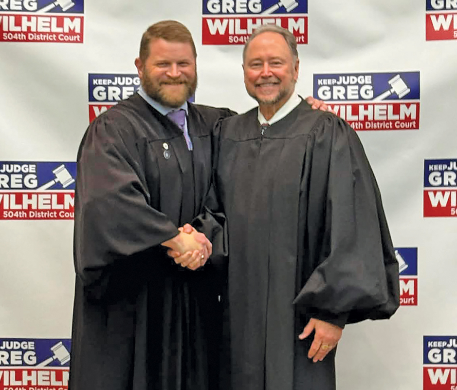 Ellis County 504th District Court Judge Greg Wilhelm (R) shown with Texas Supreme Court Justice James P. Sullivan, who administered Wilhelm the oath of office. Photo courtesy Monica Wilhelm