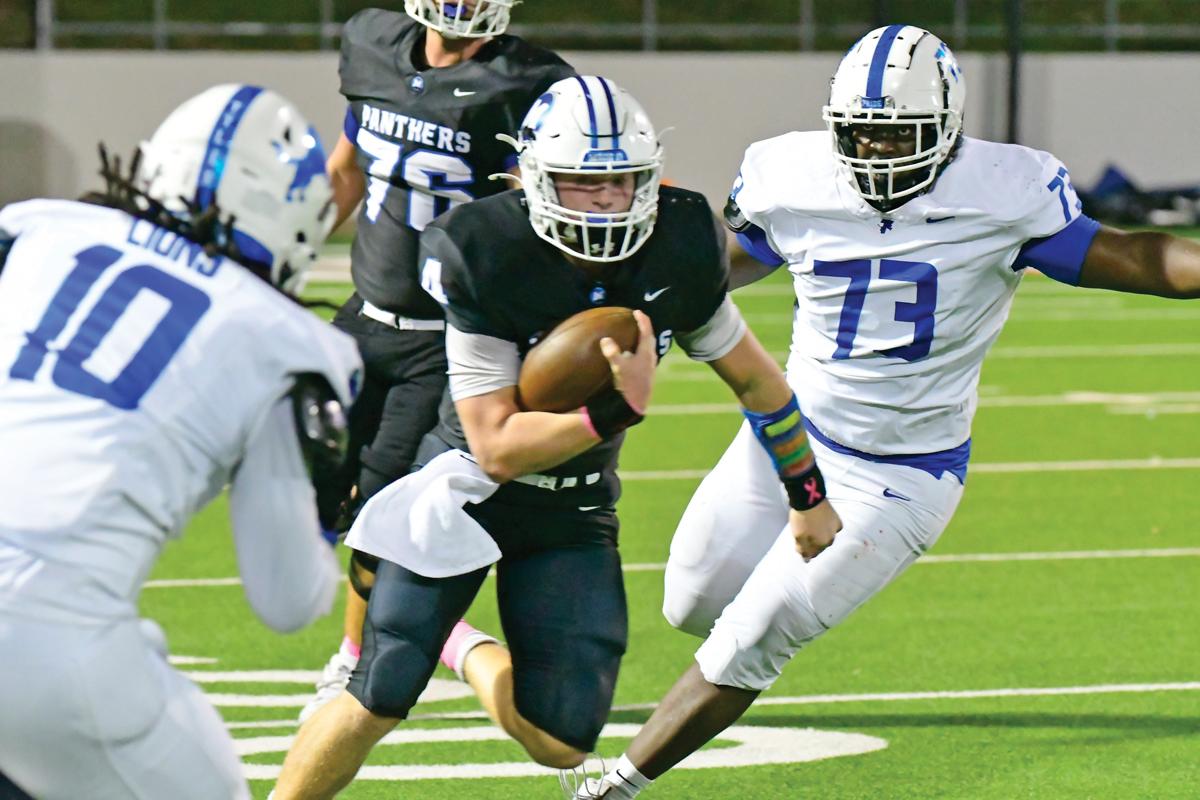 Midlothian quarterback Beau Wendel led all rushers with 107 yards and a touchdown. Photo by Fred Phipps.