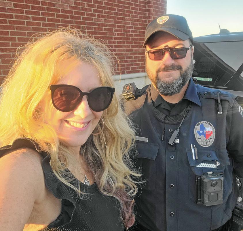 Red Oak’s Officer Grimes and Rita Cook.