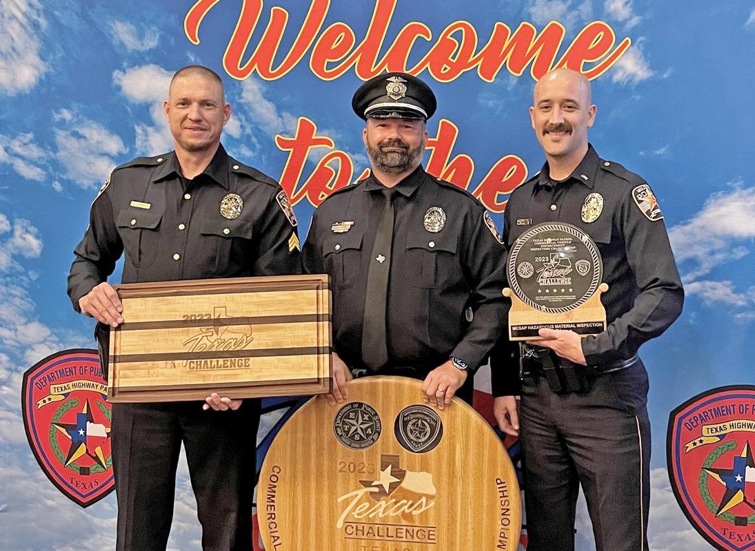 Sergeant James Jordan, Officer Chris Vinson and Commander Nick Harp.