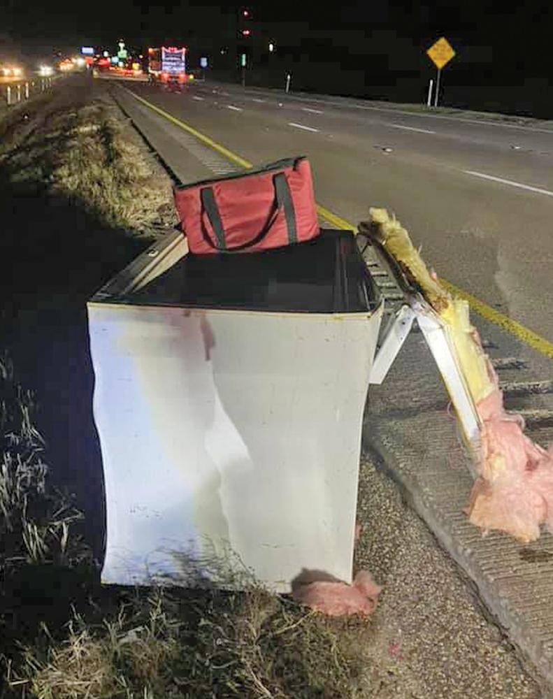 Police are investigating how a refrigerator loaded with marijuana ended up along Interstate 45 in southern Dallas County.