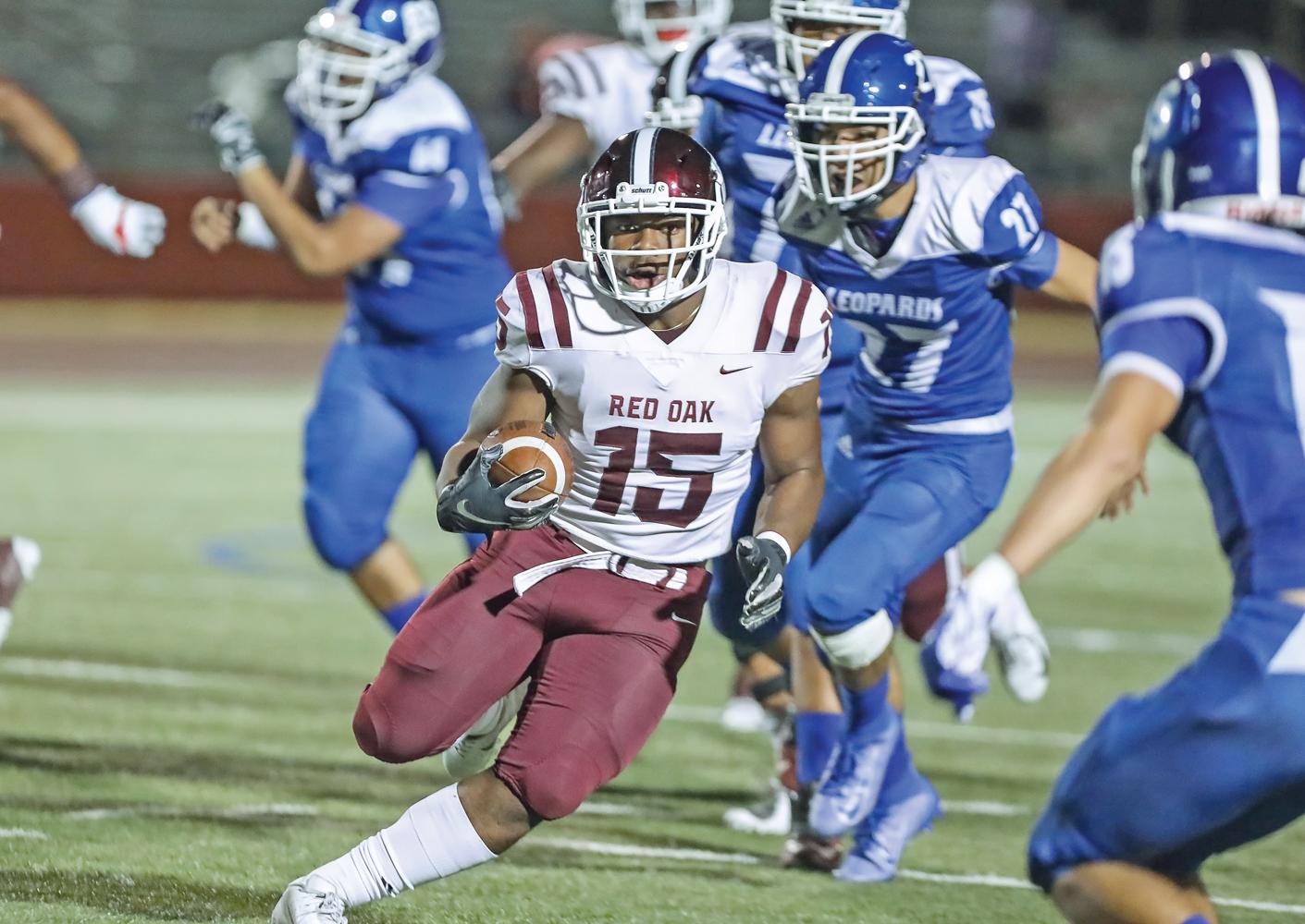 C.J. Palmer (15) rushed 7 times for 163 yards and two touchdowns in Friday’s blow-out of Adamson. The Hawk running backs as a team averaged 19.7 yards a carry. Photo by Steve Patterson / Moving Pictures.