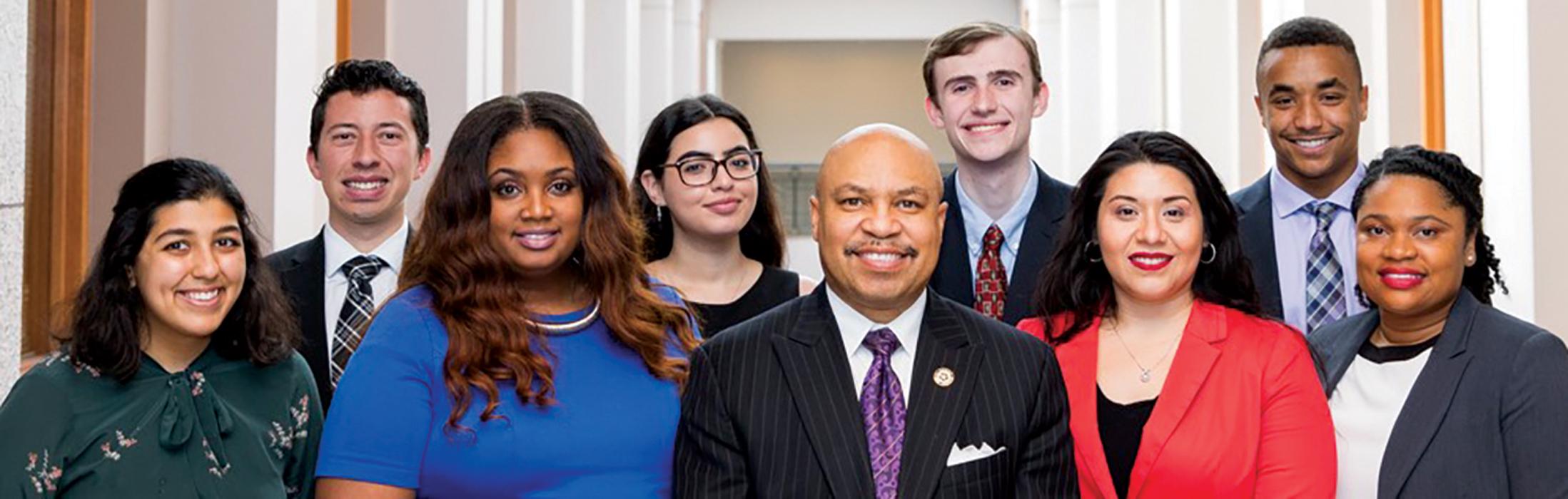 State Representative Carl Sherman, center, is shown with his diverse staff.