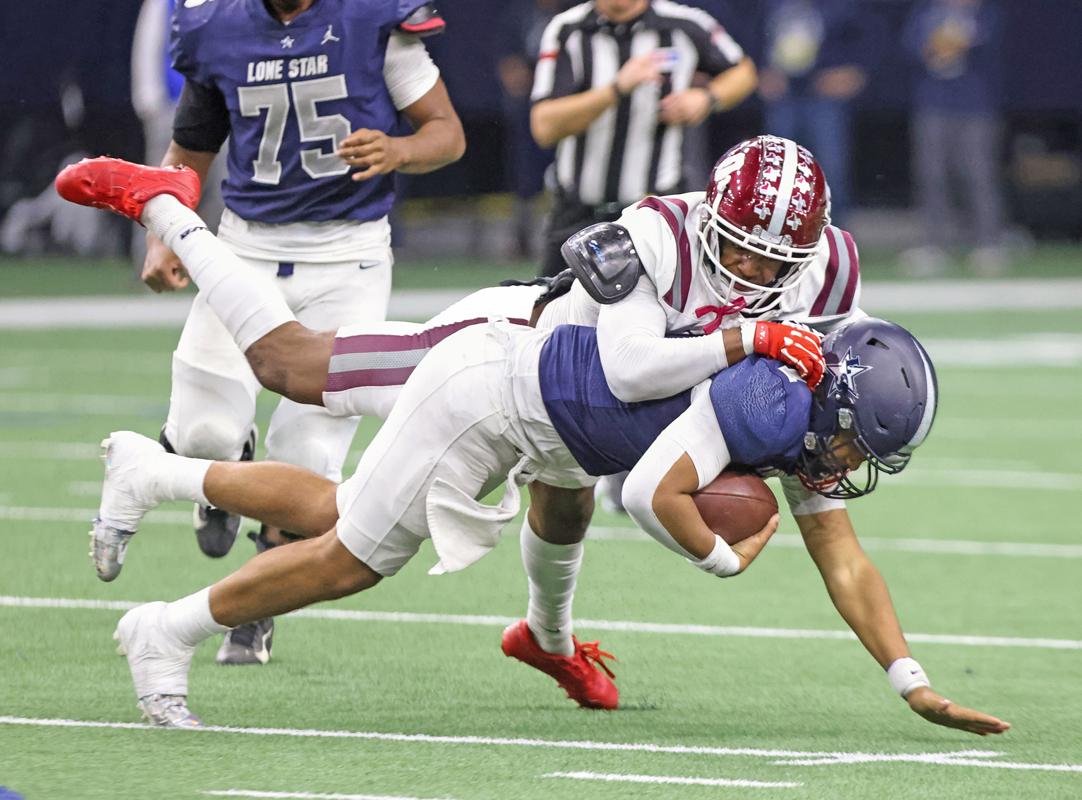 Red Oak defensive end Dior Gammon drops the Ranger’s quarterback in the 2nd half of the game.