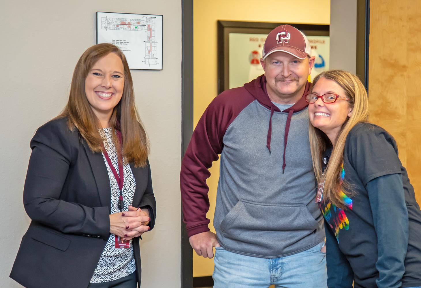 Sean and Laura Kelly take a moment to get a photo with Mrs. Brenda Sanford during the reception.
