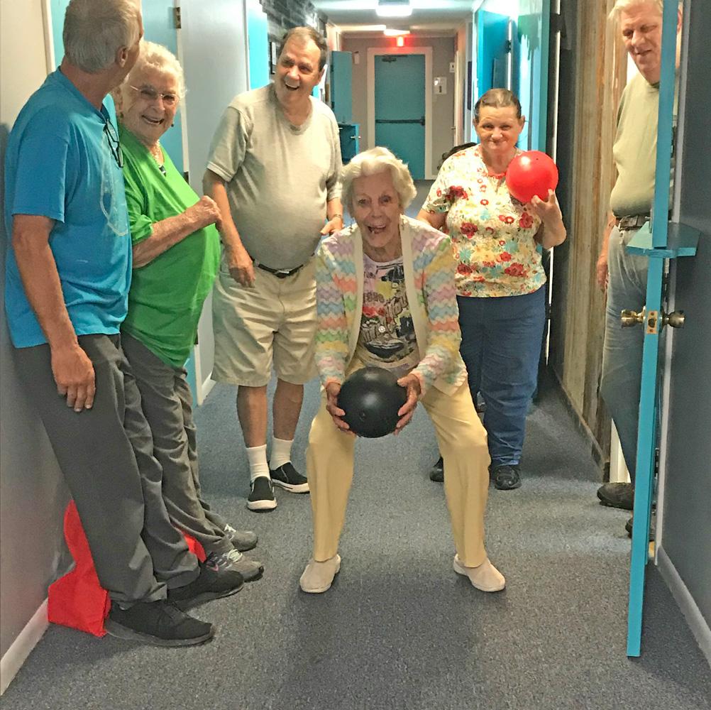 Seniors enjoying “Friday Free Style” and celebrating birthdays with a little hall bowling Friday, April 26.