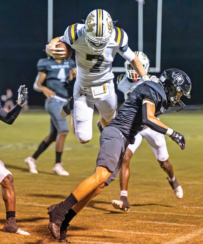 Italy quarterback Gared Wood helped the Gladiators soar past Cayuga 34-26 in the game’s closing minutes. Wood rushed for 3 TDs, and 150 yards on 16 carries, and completed 3-of-9 passes for 144 yards and 2 TDs. Photo by Madison Thompson.